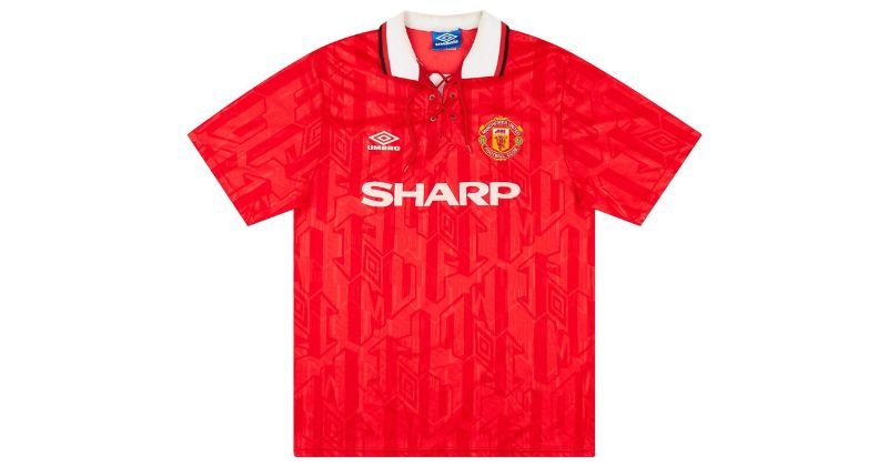 red 1992-94 manchester united home shirt with lace-up collar and umbro pattern on the shirt